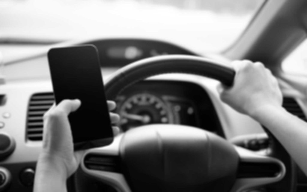 Using a mobile phone while driving in traffic